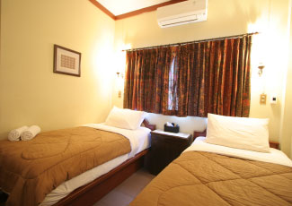 STANDARD AIR CON ROOM WITH 2 SINGLE BEDS