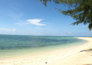 CLEAR WATER AND WHITE SAND BEACH