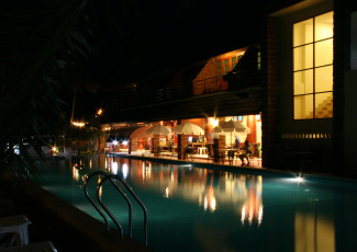 Restaurant by the swimming pool at night time