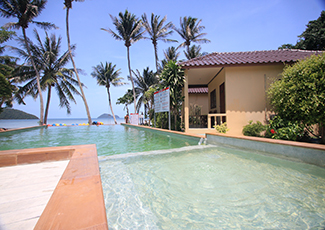 Large swimming pool with sunset view